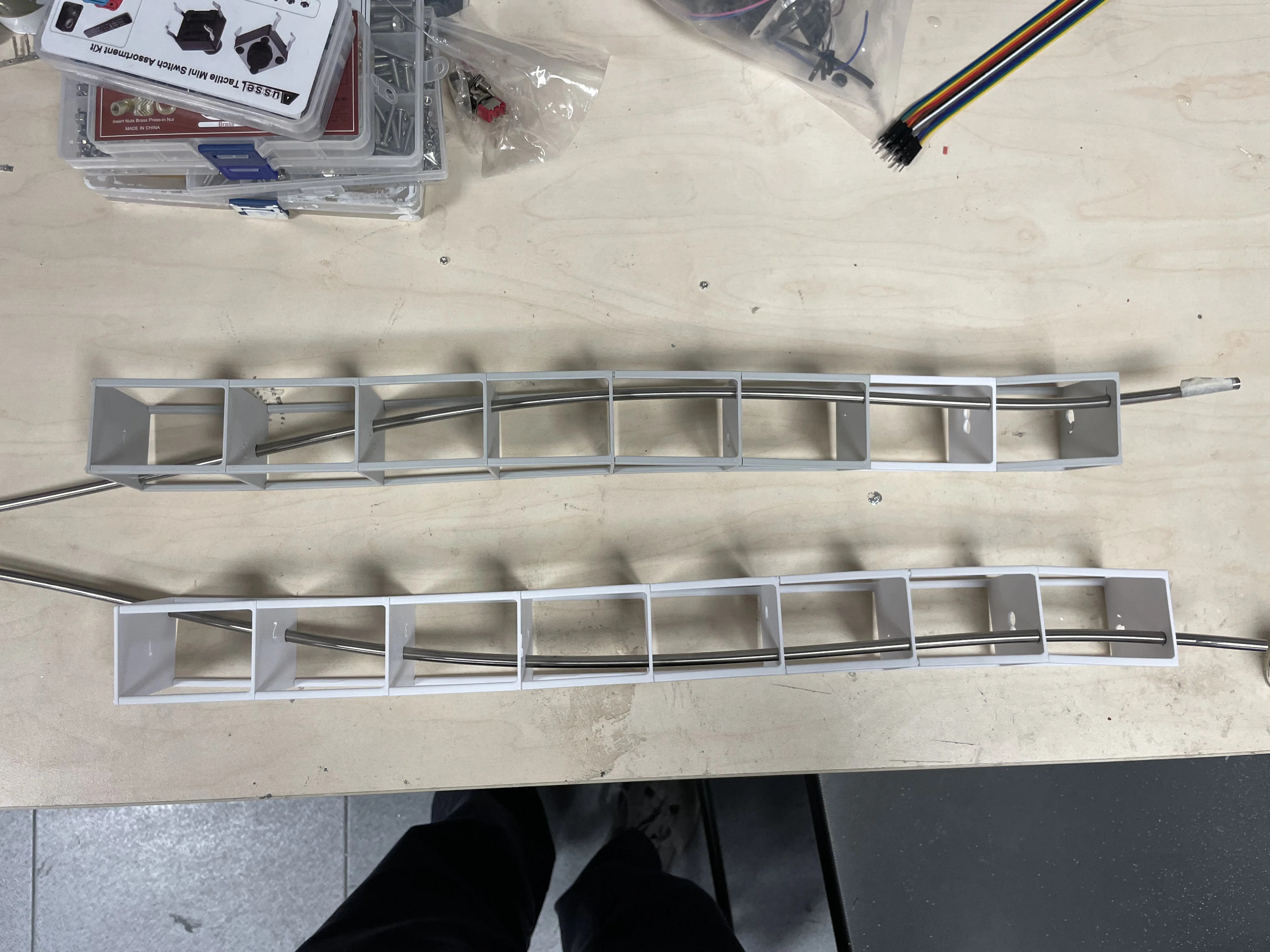 Alignment jigs that I invented to verify the curves of the rods that were manually curved with a 0.5mm precision deviation from primary axis